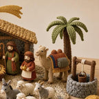 Nativity crochet camel, palm tree and well detail