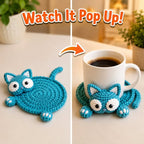 Blue crochet animal coaster shown flat and raised around a coffee mug